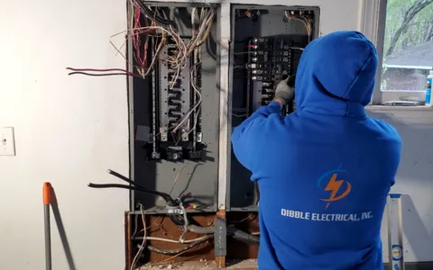 Dibble Electrical technician replacing an outdated residential electrical panel in Central Virginia